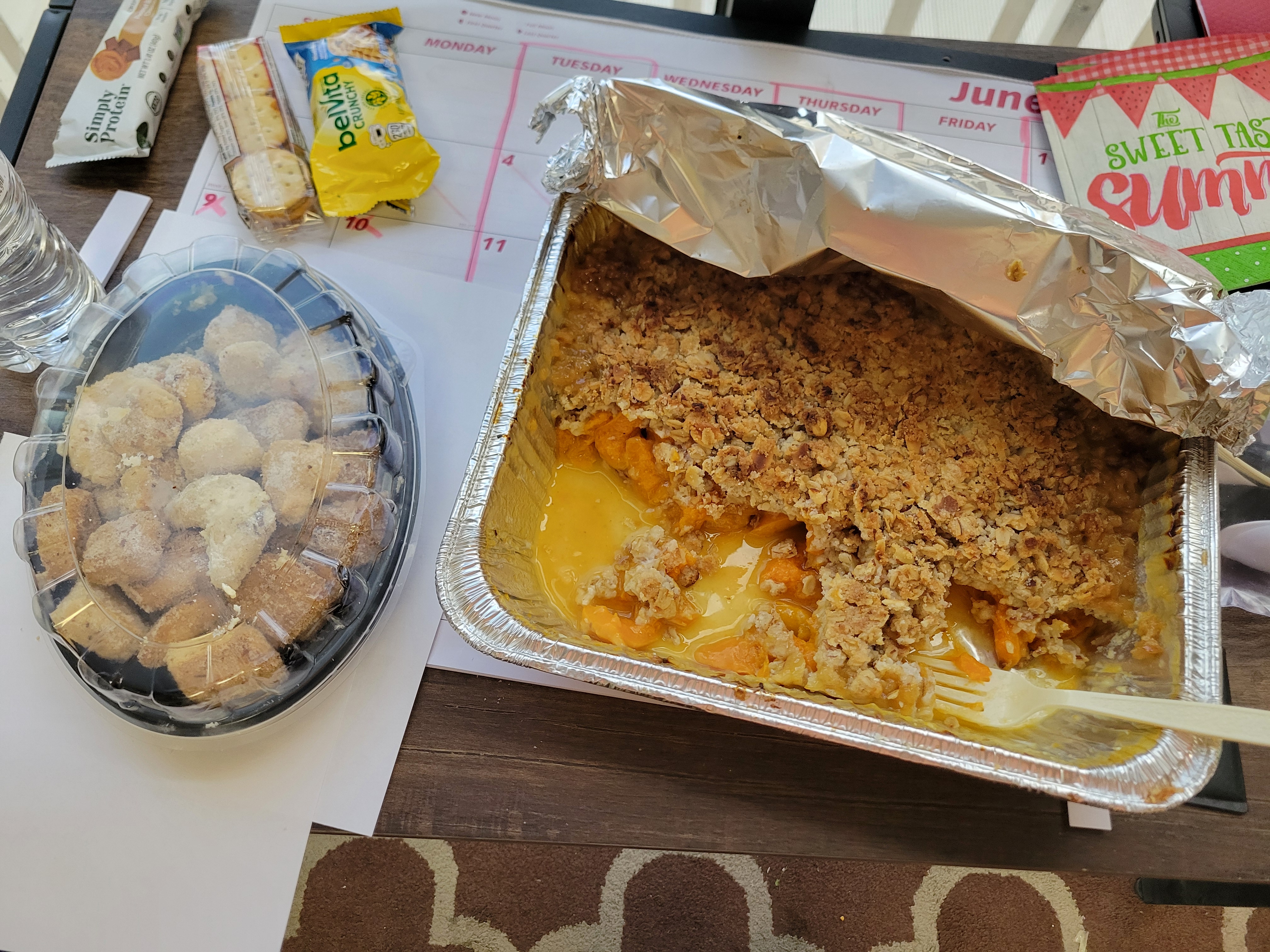 Tray of garlic bites and peach crisp.